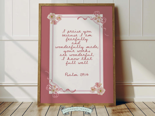 Create a peaceful and faith-filled space with this Psalm 139:14 nursery wall art, featuring the beloved “Fearfully and Wonderfully Made” Bible verse in soft pink lettering set against a gorgeous pink background adorned with delicate bows and soft pink and yellow watercolor wildflowers. This beautiful Christian nursery print is a meaningful reminder that every child is wonderfully made and deeply loved by God.