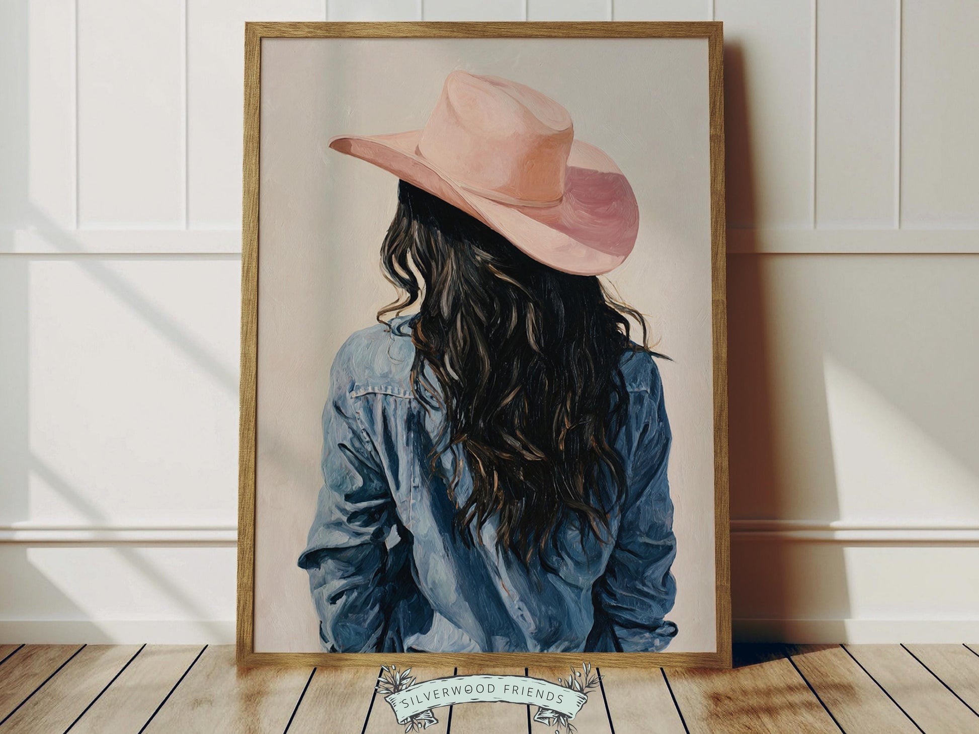 Create a calm and beautiful space with this western cowgirl wall art print, featuring a softly styled portrait of a cowgirl in a pink cowgirl hat, illustrated in a dreamy oil painting style with visible brushstroke texture and warm, rustic tones. This timeless artwork has a rich, canvas-like finish that adds depth, softness, and a charming farmhouse feel to any room.