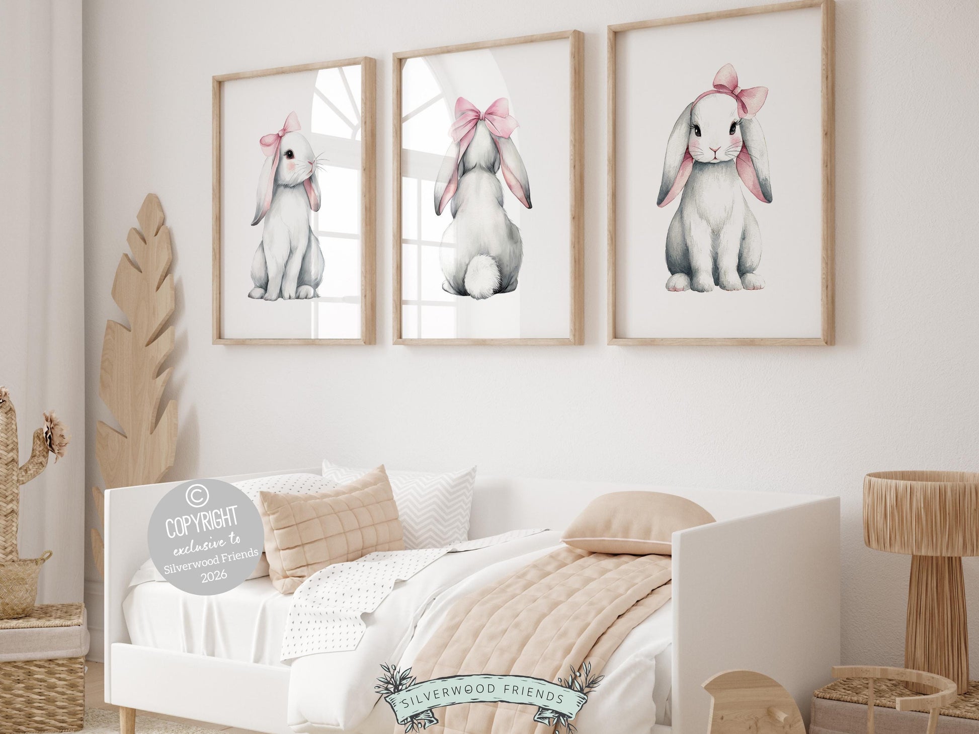 Our delightful minimalist Set of 3 Bunny Nursery Prints features adorable white bunny rabbits in pink bows. Perfect for your baby girl's woodland nursery decor and also makes a unique baby shower gift.