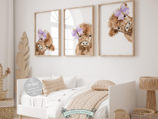 Create a sweet and charming space with this peeking highland cow nursery wall art set, featuring adorable watercolor baby highland cows playfully peeking into the frame, each styled with soft purple lilac bows on a clean white background. Designed in gentle neutral tones with a touch of feminine detail, this farm animal nursery print set adds warmth and personality to any baby nursery, girls bedroom, or farmhouse-inspired space, making it a timeless and delightful decor choice.