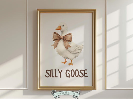 Create a warm and playful space with this “Silly Goose” nursery wall art print, featuring an adorable watercolor goose with a soft oversized bow for a sweet, coquette-inspired touch. Designed in gentle neutral tones with a whimsical, storybook feel, this farm animal nursery print adds charm and personality to any nursery, kids bedroom, or playroom, making it a timeless and delightful decor piece.