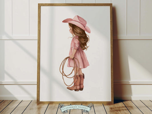 Create a warm and whimsical space with this western cowgirl nursery wall art print, featuring a beautifully illustrated watercolor cowgirl holding a rope, dressed in a soft dusty pink dress with classic cowboy boots and hat. Designed in gentle, earthy tones with a charming storybook feel, this western nursery print adds a cozy farmhouse touch to any baby girl nursery, bedroom, or playroom, making it a timeless and stylish decor piece.