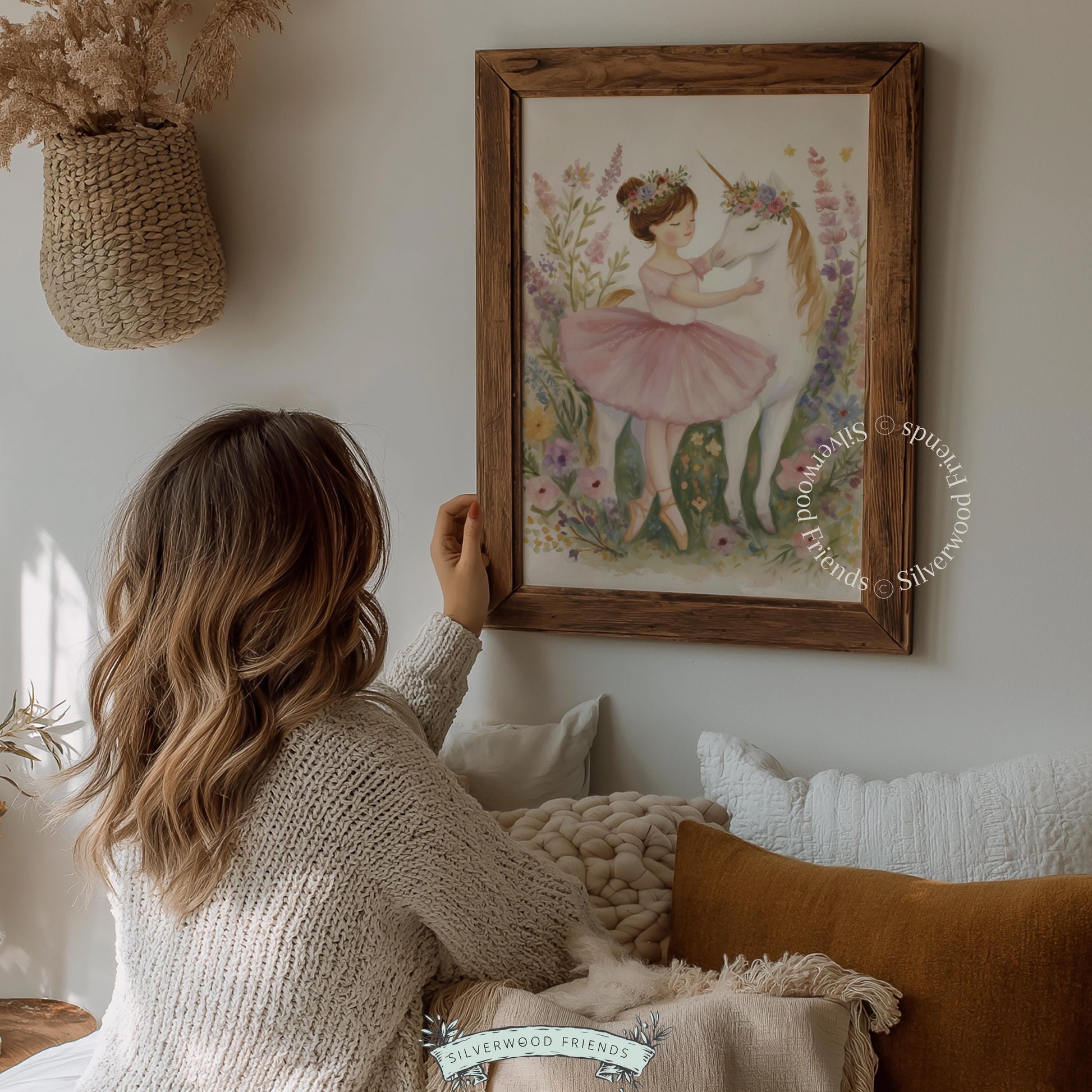 Cute pink tutu artwork for nursery walls — a charming scene of a ballerina and unicorn amidst delicate floral elements.