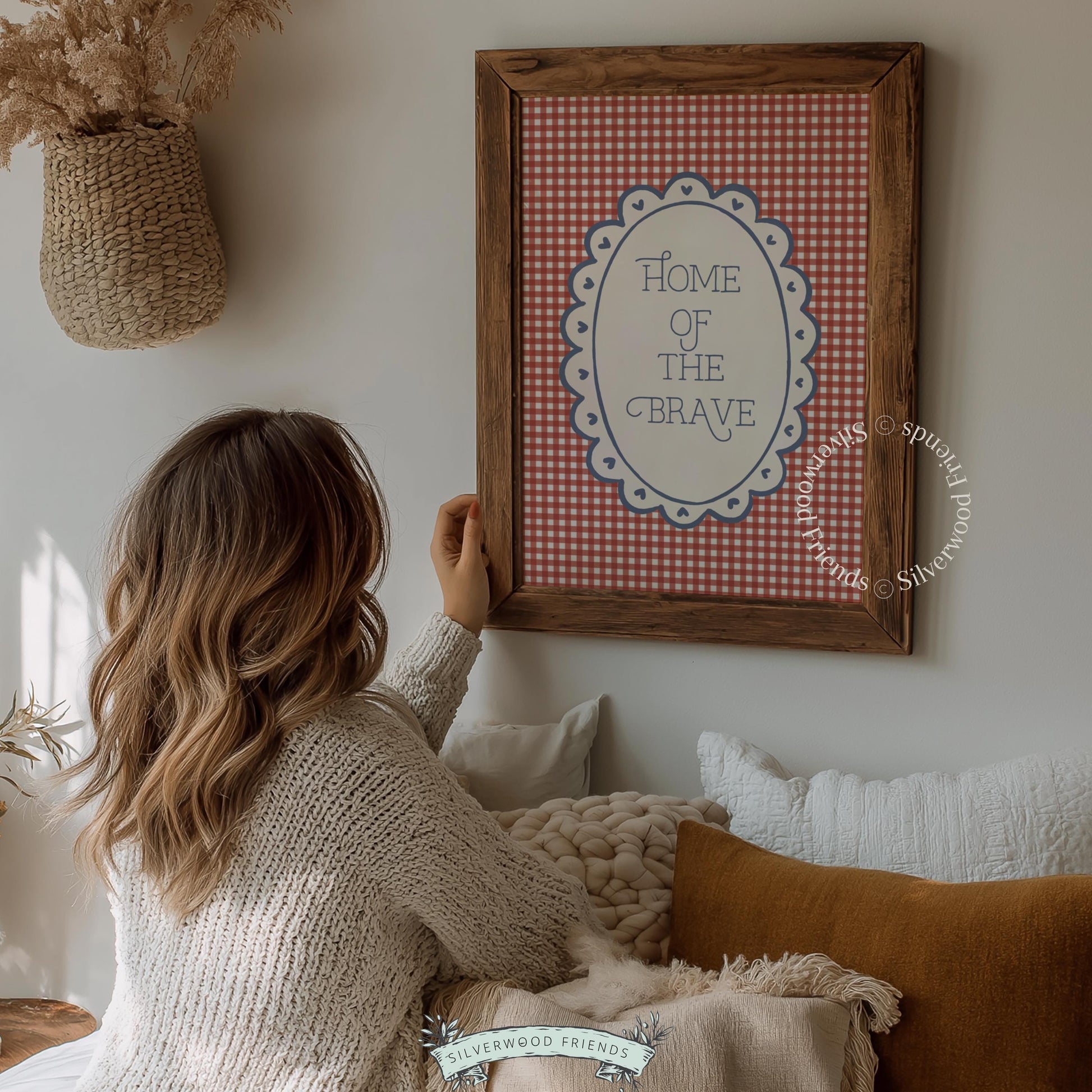 "Home of the Brave" cottagecore wall picture — festive red gingham with navy typography and scalloped details
