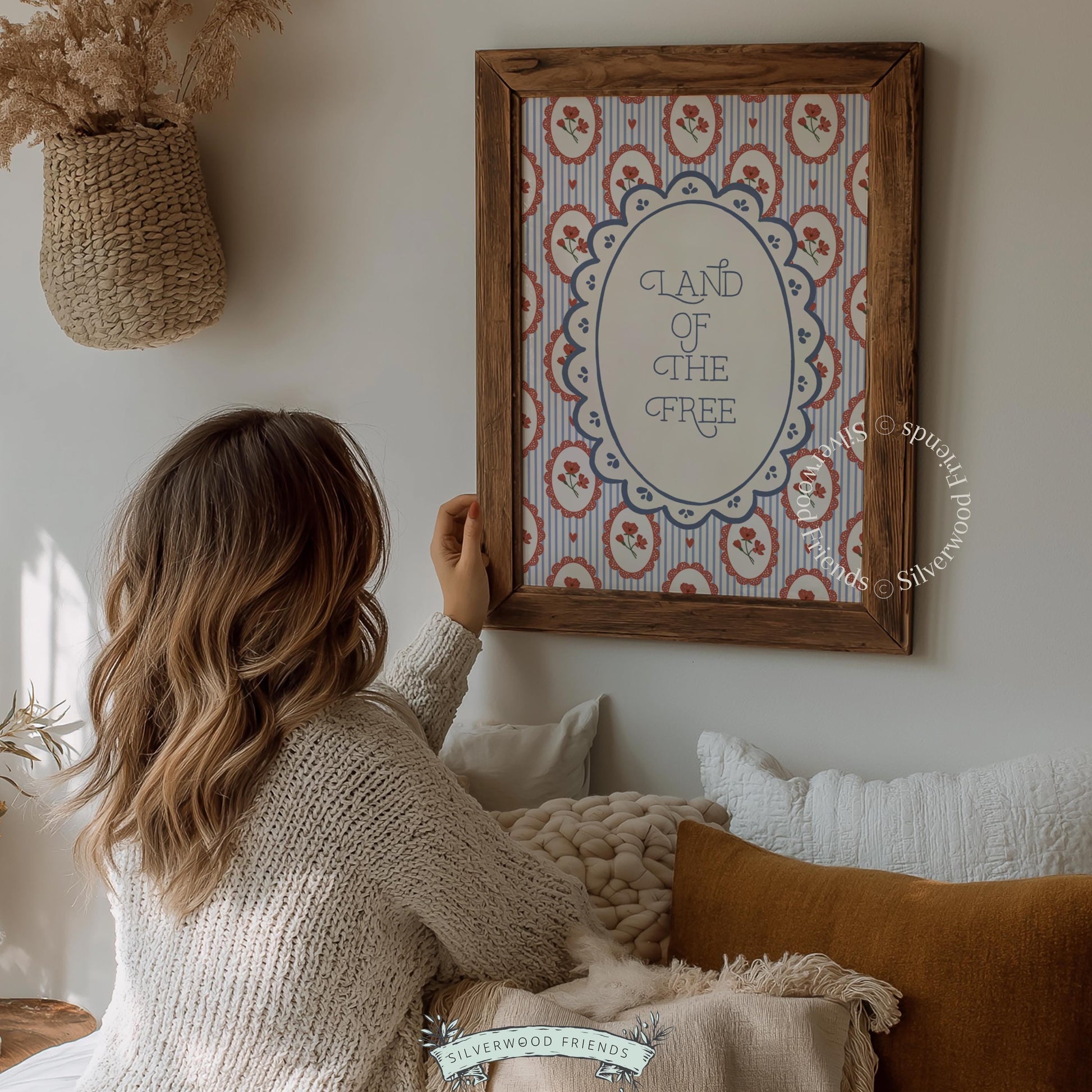 Scalloped oval typography picture for entryway — charming red, white, and blue floral medallion repeating pattern design