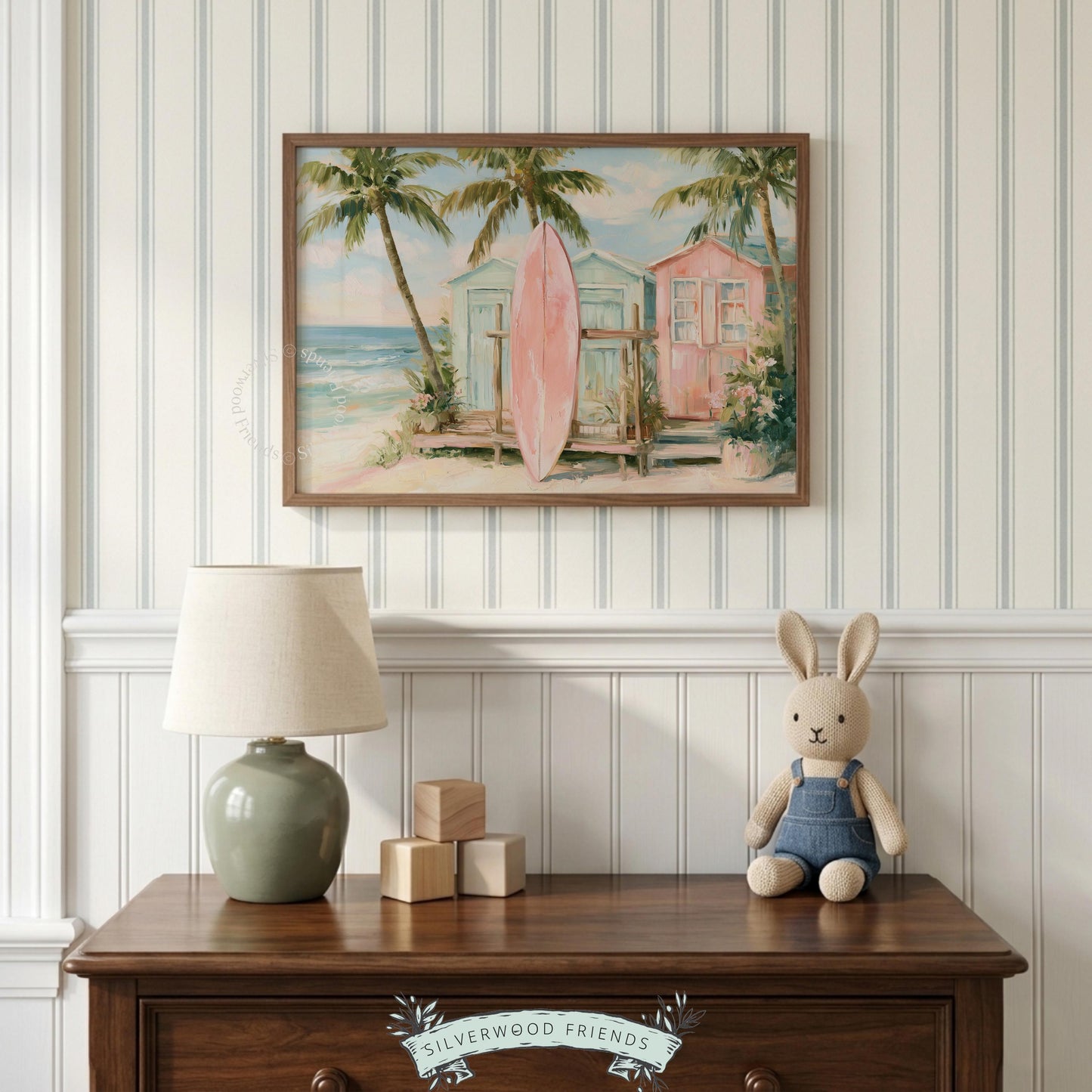 Coastal wall art for coastal nursery — whimsical illustration of a pink surfboard surrounded by pastel beach houses.