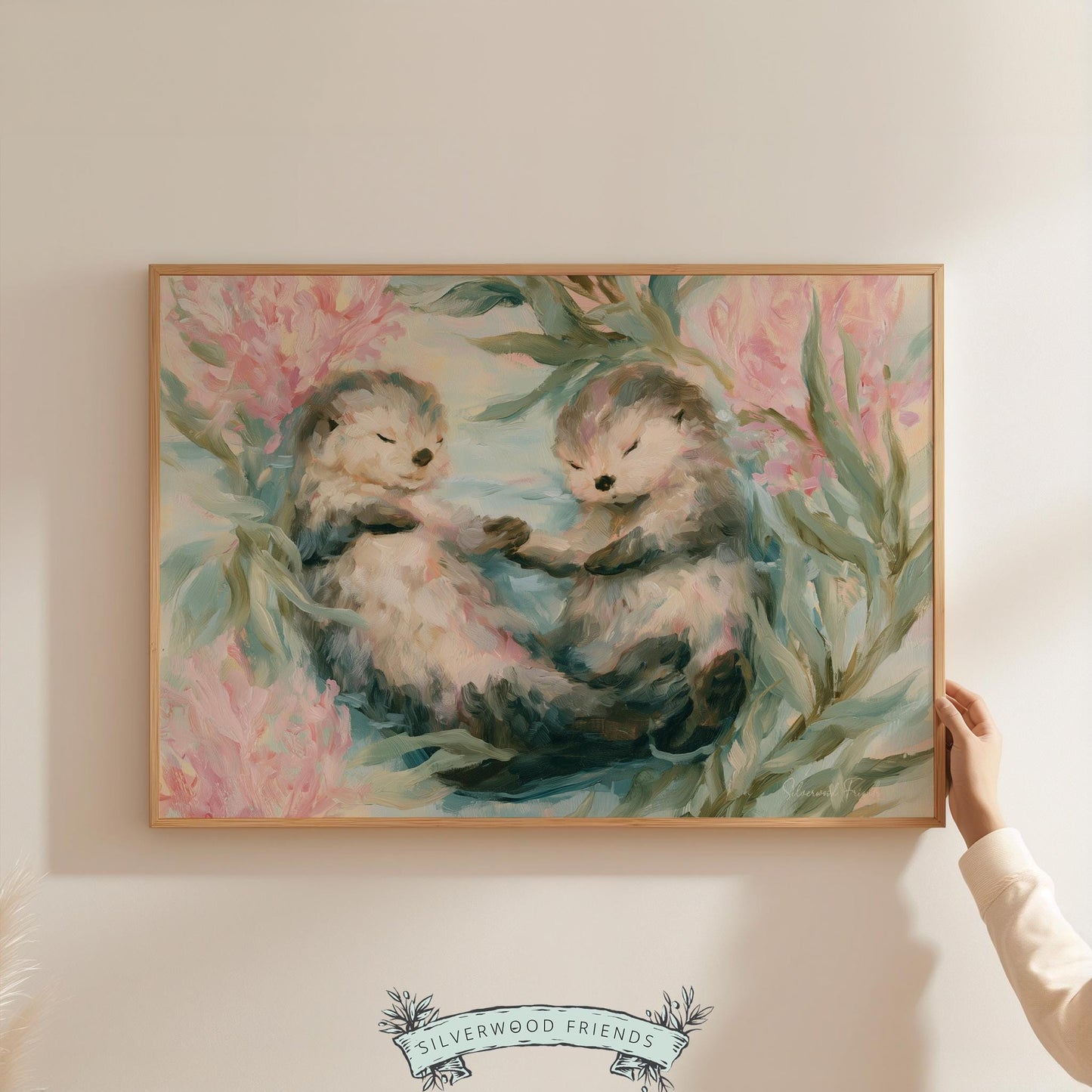 Two sea otters floating wall art for nursery — soft pastel colors create a cute and calming ocean theme.