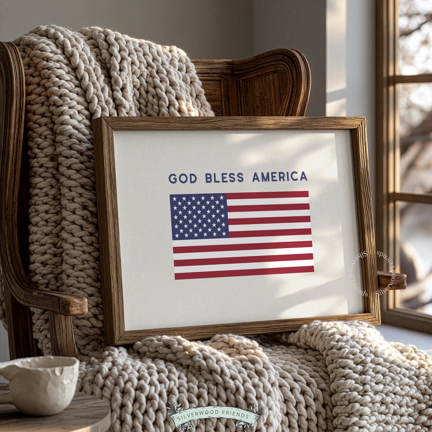 Americana artwork featuring centered red, white, blue flag with patriotic phrase modern minimalist style
