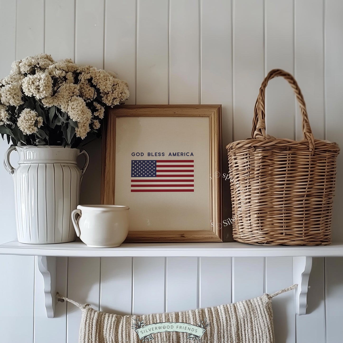 USA patriotic poster with centered flag graphic — cream background featuring "God Bless America" bold lettering