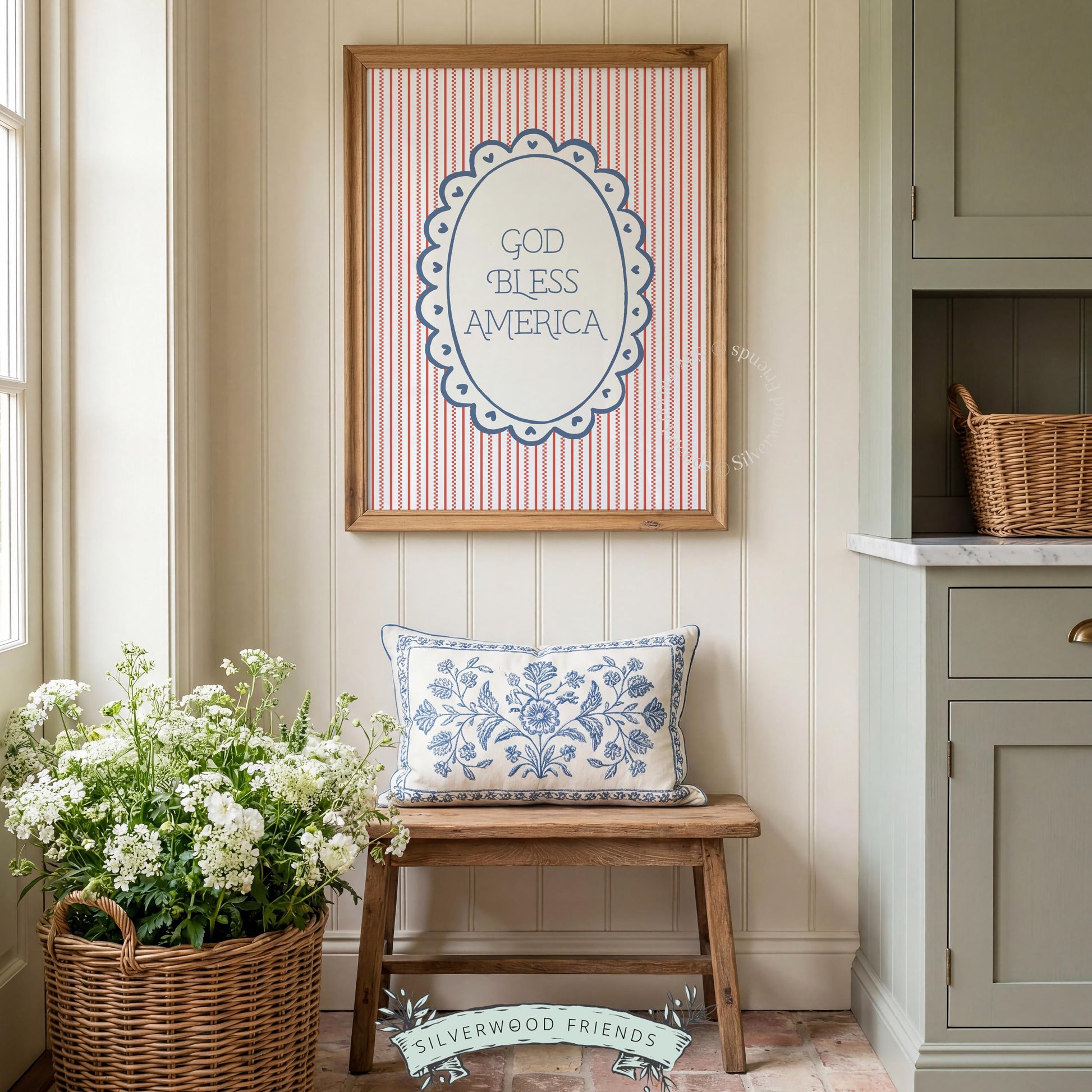 God Bless America typography poster with scalloped oval frame and heart embellishments on red pinstripe background