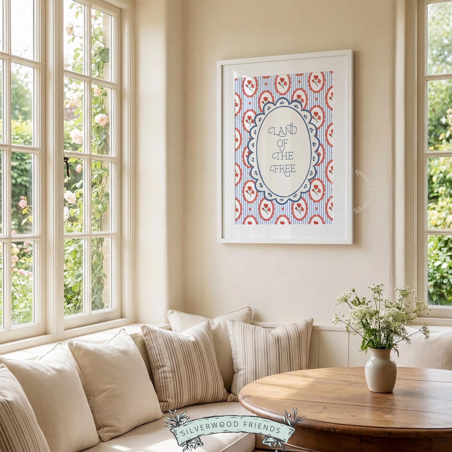 Vintage greeting card-inspired digital print for living room — "Land of the Free" quote with festive cherry blossom pattern