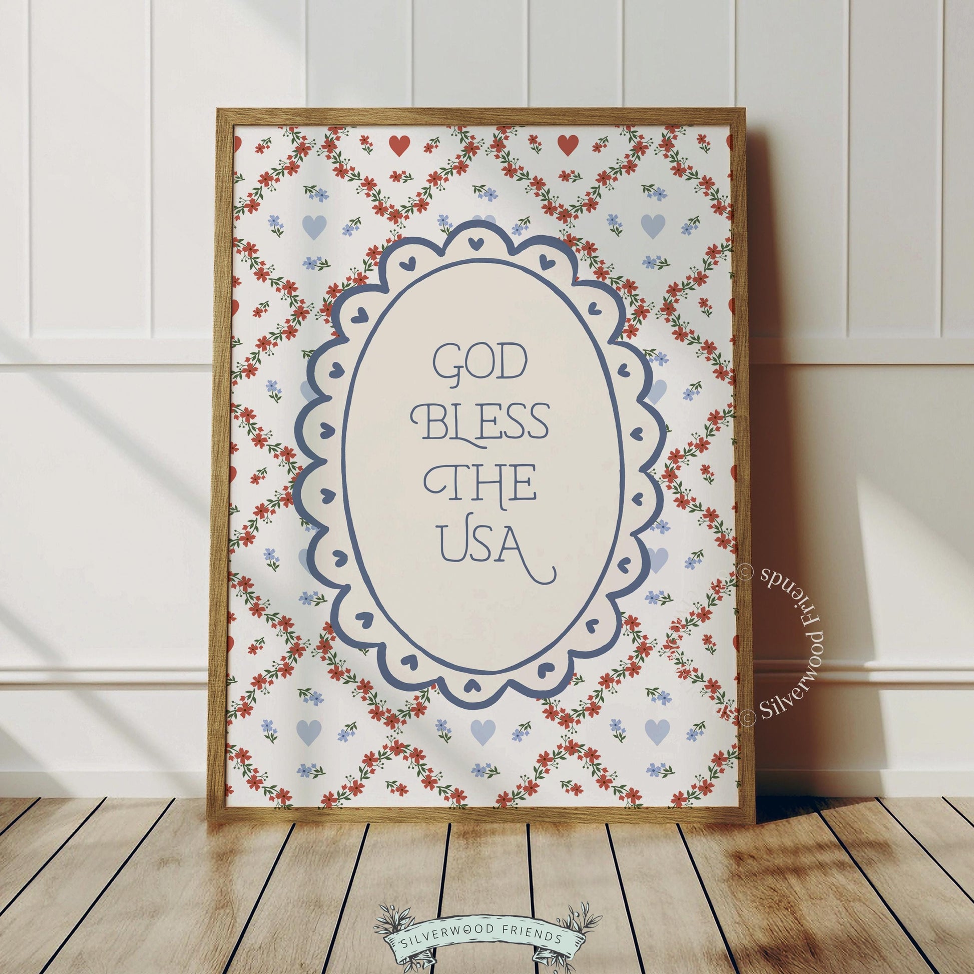 God Bless the USA typography poster for patriotic home — vintage scalloped frame with red, white, blue hearts and folk art florals