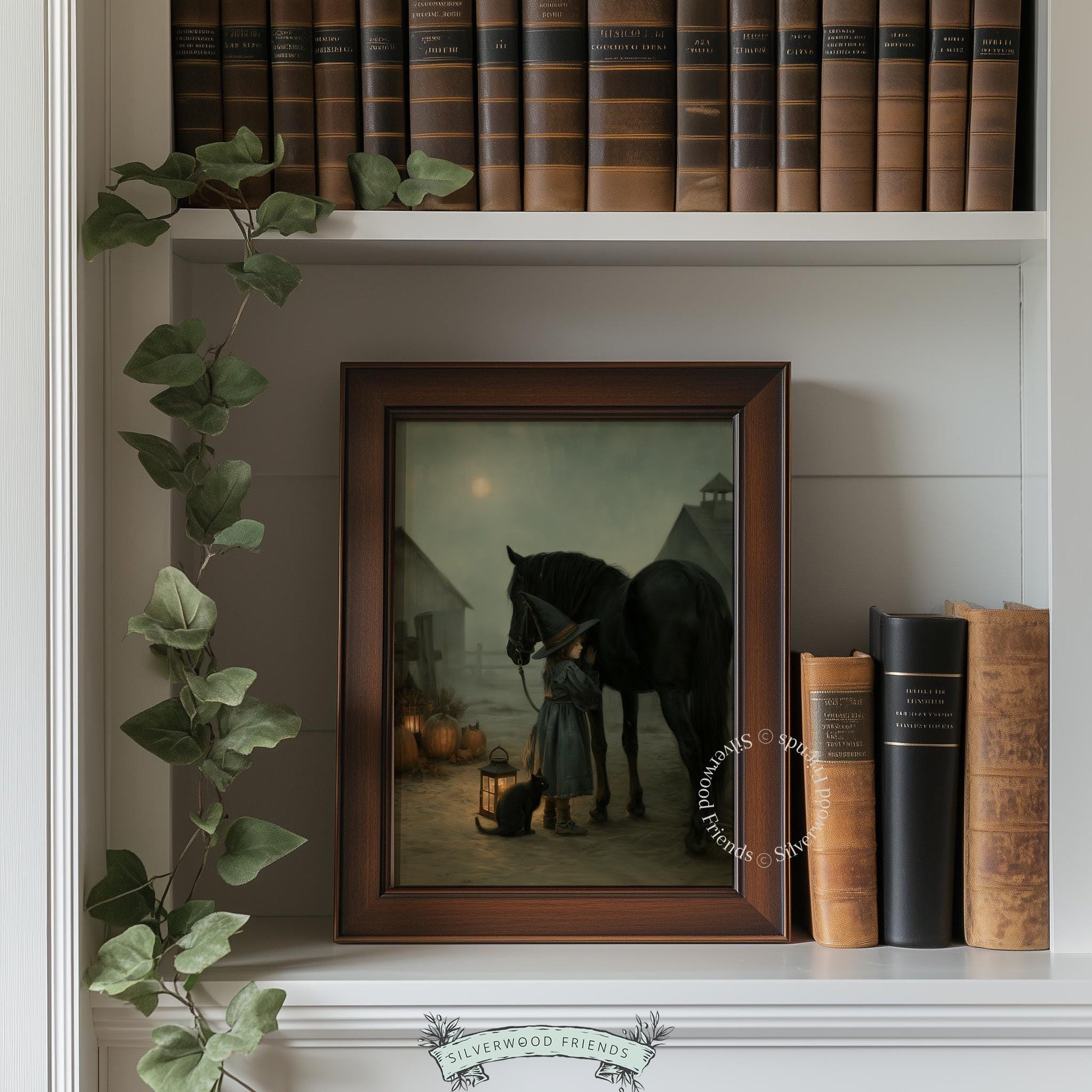 Mystical witch with lantern and cat artwork — dark, atmospheric fall hosting decor with moody pumpkin display