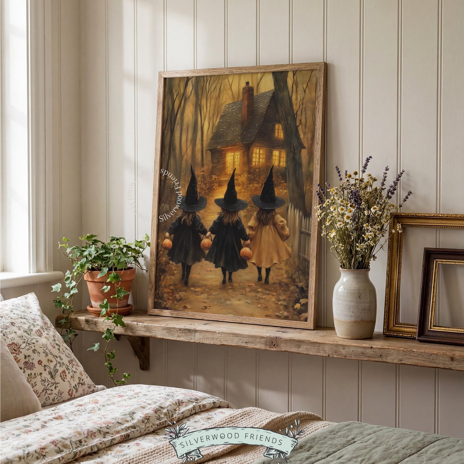 Three young witches trick-or-treating printable art for entryway — vintage Halloween painting with amber glow and cottage woodland scene