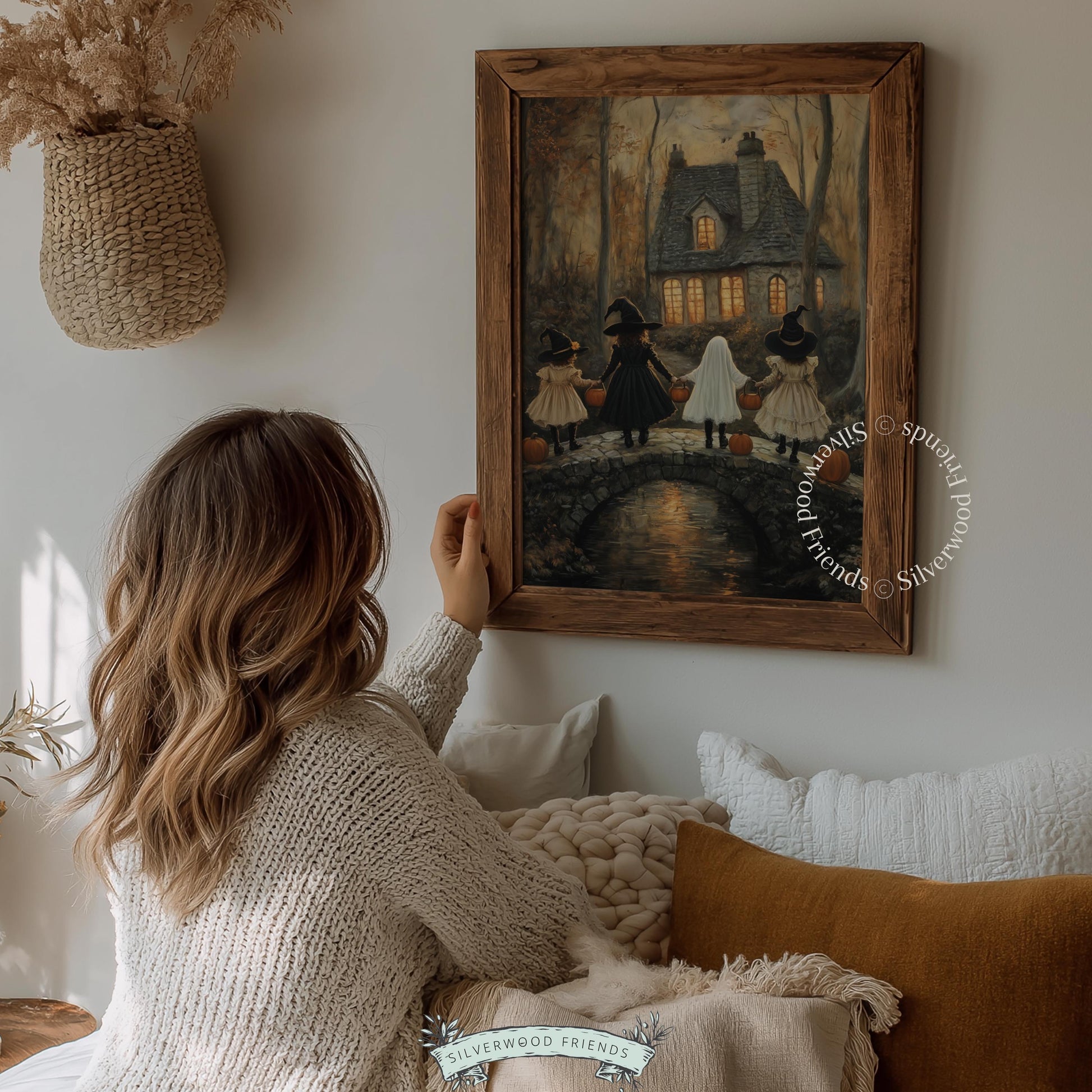 Halloween night scene wall art — digital print showing kids in masks approaching stone cottage with golden lighting