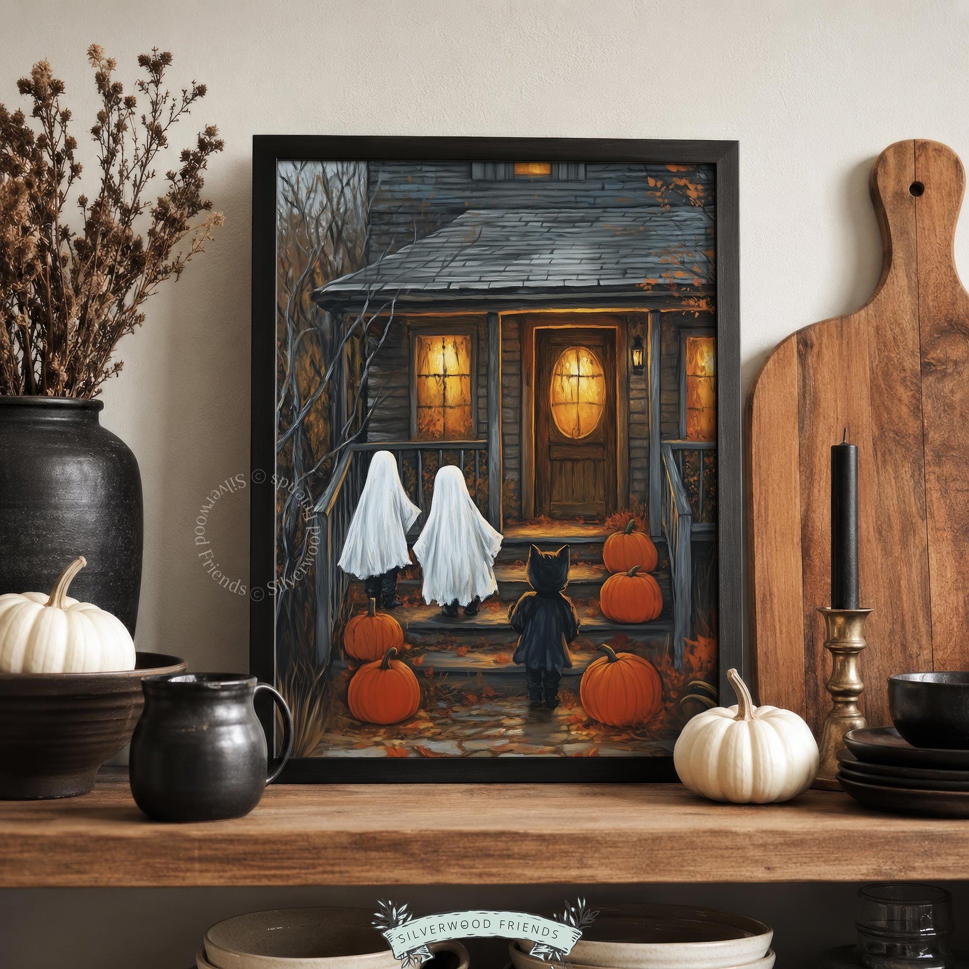 Ghostly figures visiting haunted cottage printable for bedroom — vintage Halloween artwork with bare trees and golden window light