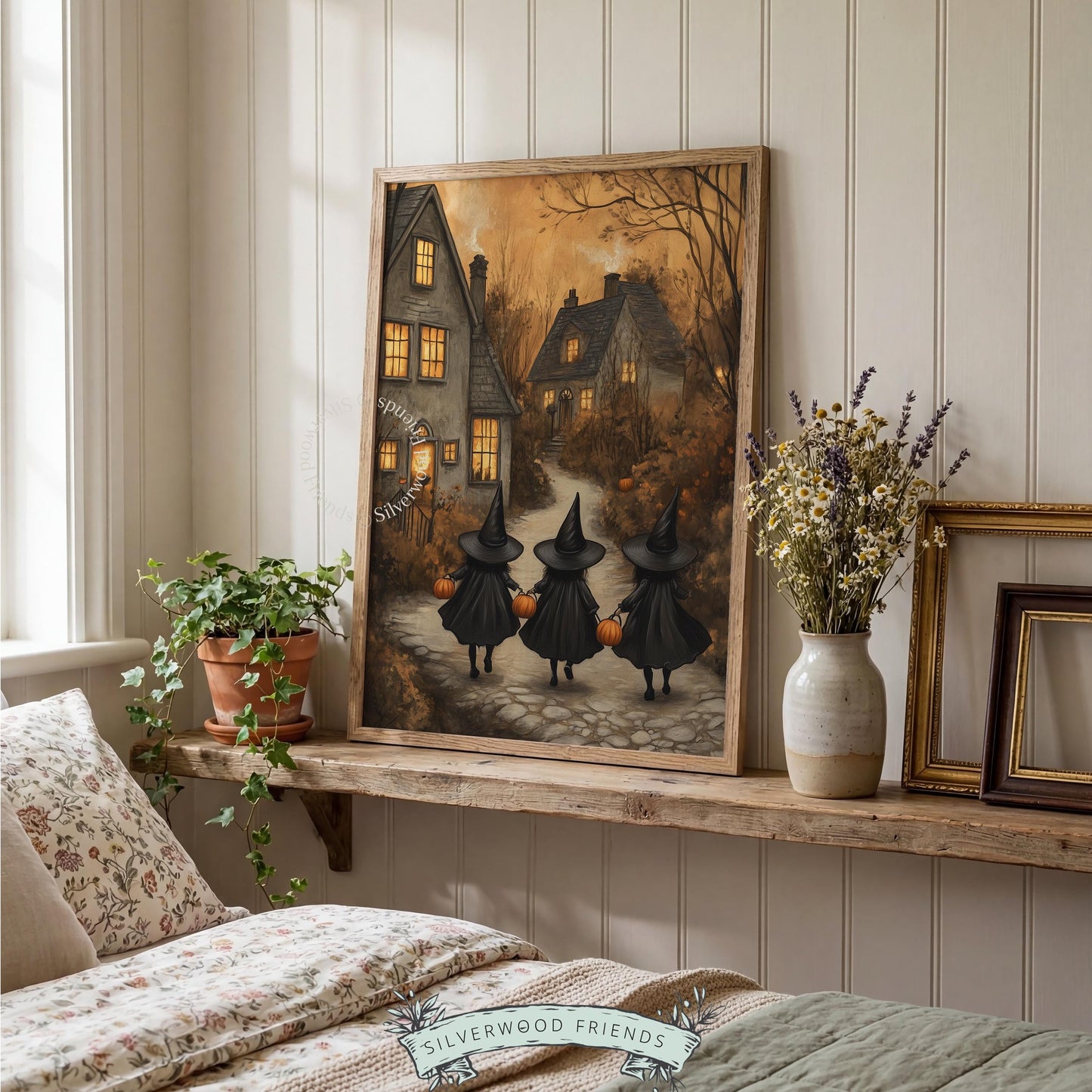 Enchanted village Halloween wall art for living room — dusky autumn scene with bare trees and golden foliage