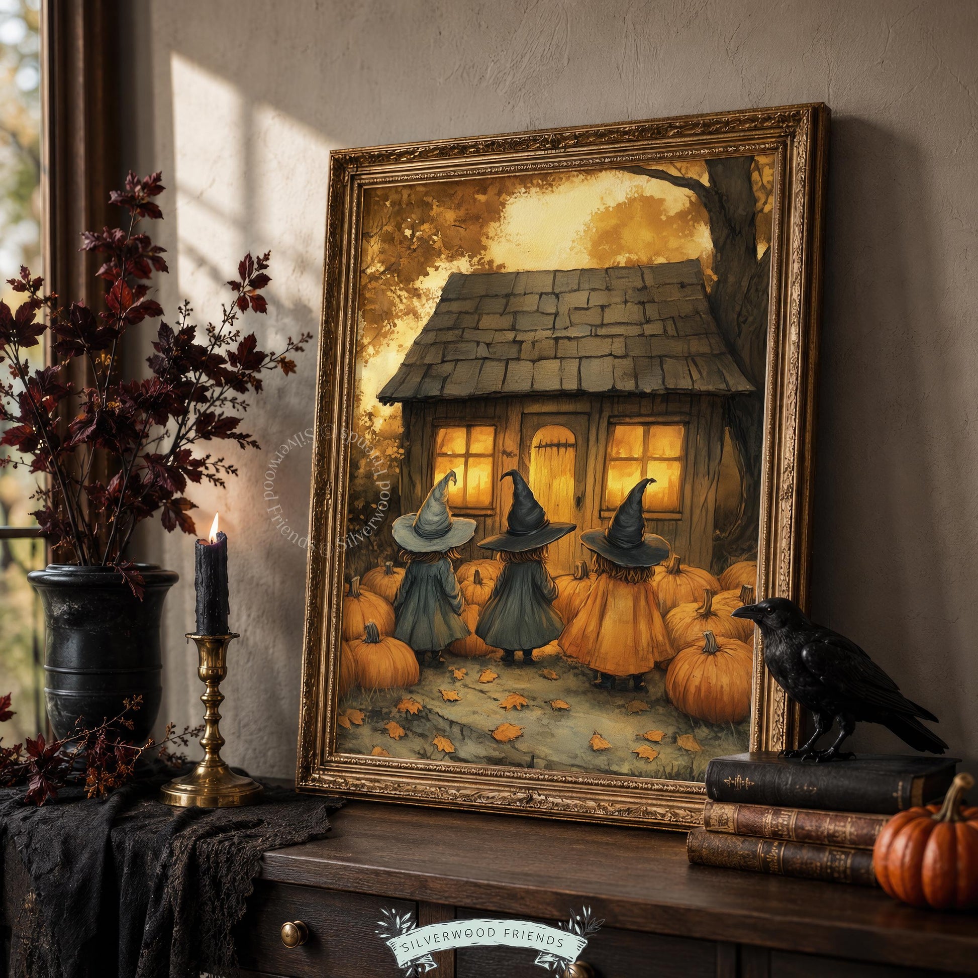 Seasonal Halloween digital print for kitchen — three dark-cloaked sorceresses with pumpkin-filled cottage backdrop