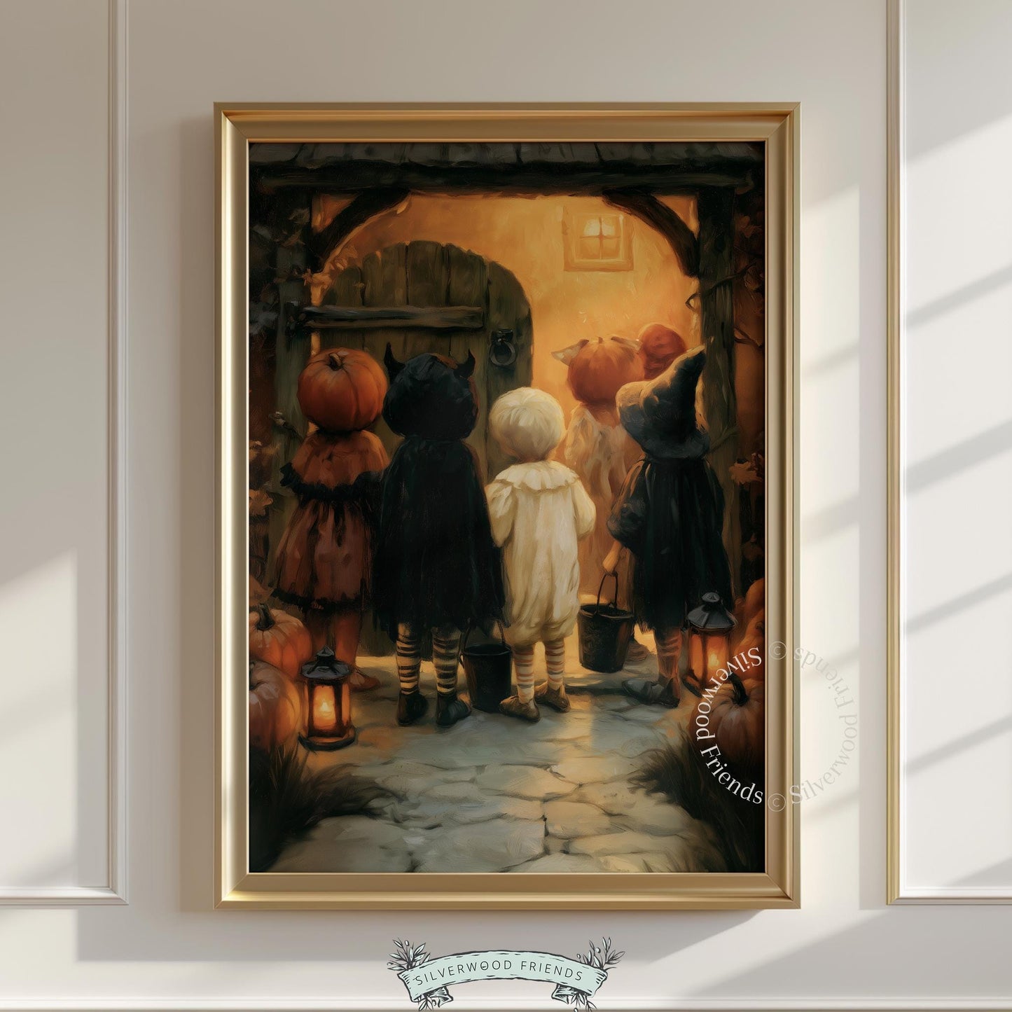 Trick-or-treaters at cottage door printable art for entryway — vintage Halloween wall decor with warm golden glow