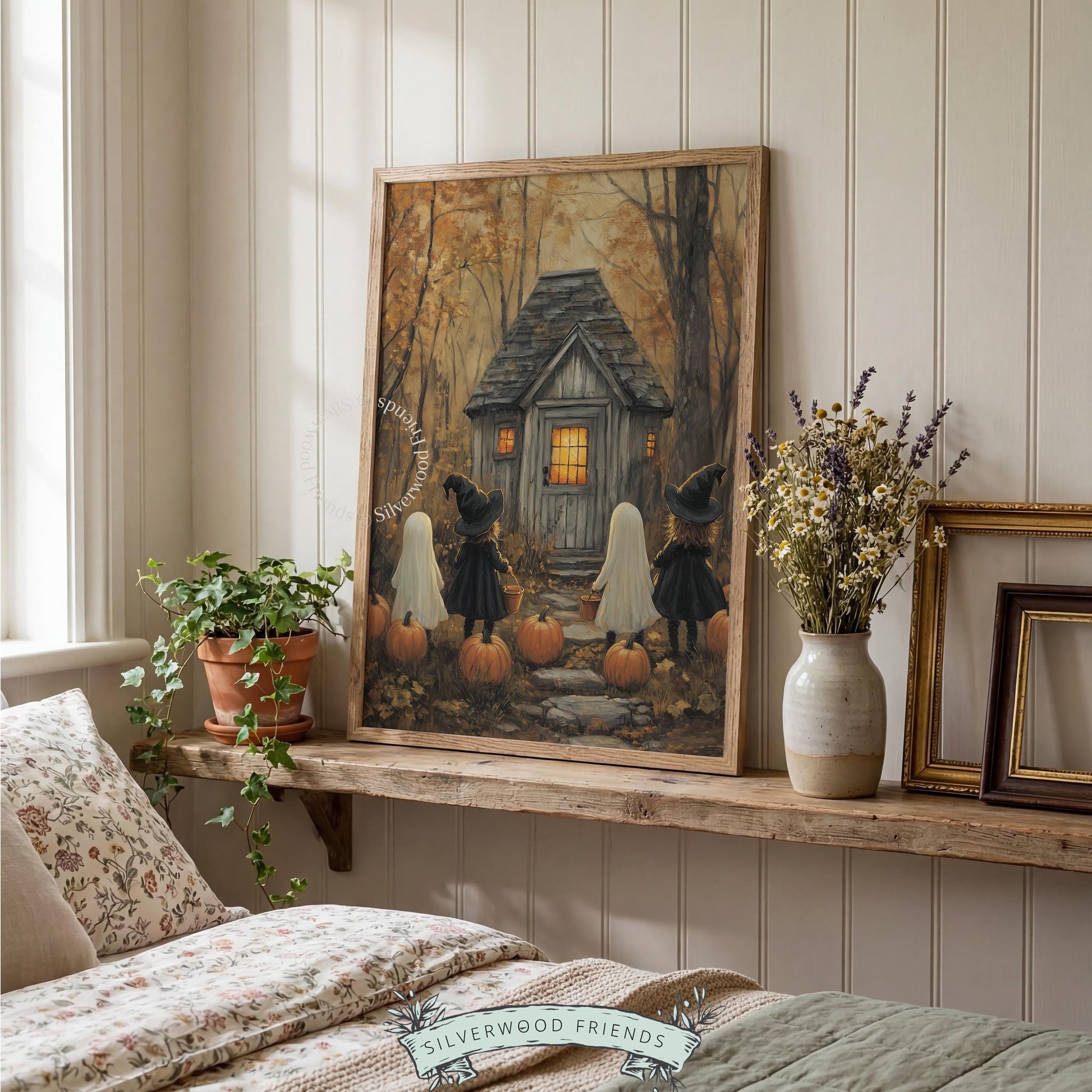 Seasonal Halloween gathering illustration wall art — cozy mood featuring costumed children at woodland stone cottage entrance