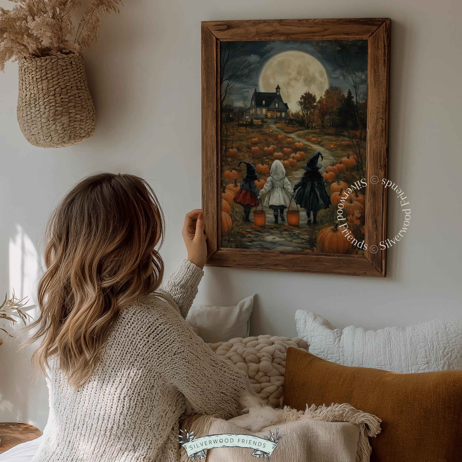 Farmhouse under full moon with Halloween-costumed children wall print for entryway — dark cottagecore witchy vibe