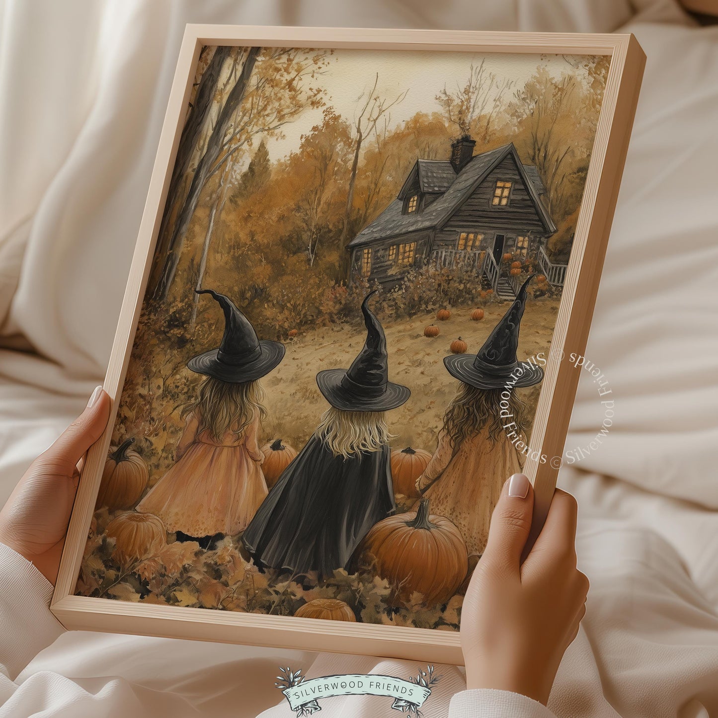 Fall hosting decor picture for parlor — three cloaked travelers approaching illuminated cottage with autumn trees and seasonal harvest elements