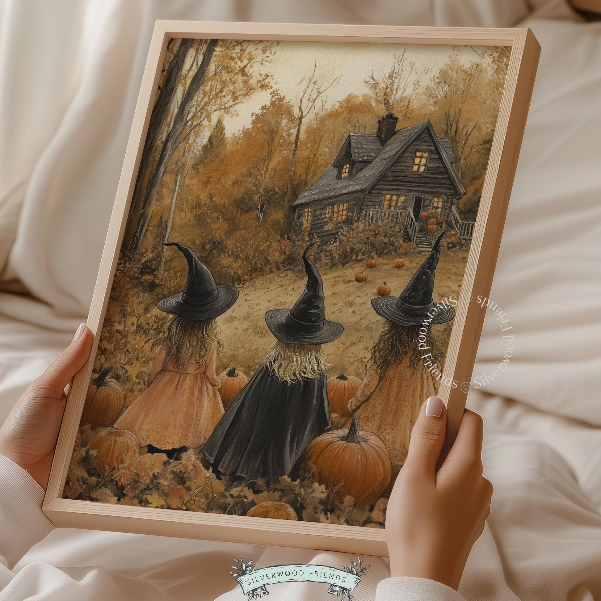 Fall hosting decor picture for parlor — three cloaked travelers approaching illuminated cottage with autumn trees and seasonal harvest elements