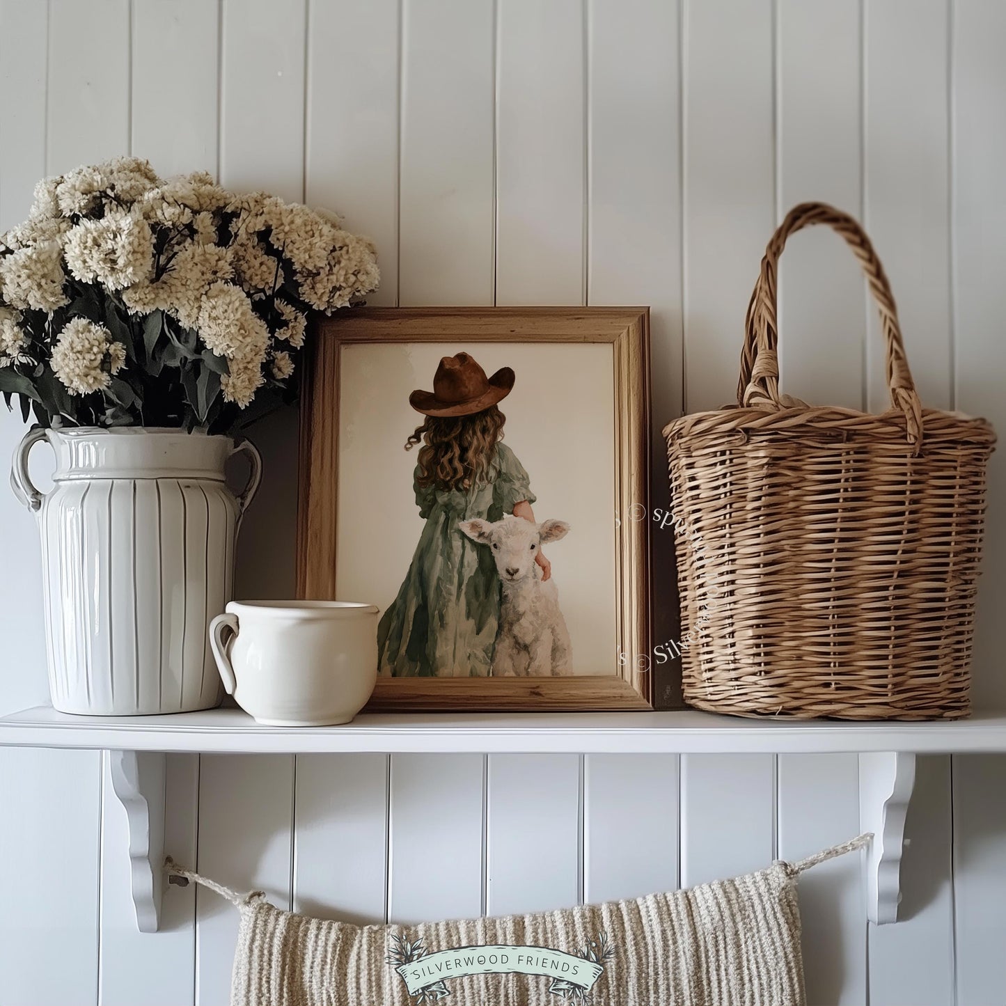 Young girl with sheep artwork for baby room — gentle watercolor farm print with sage tones and tender atmosphere
