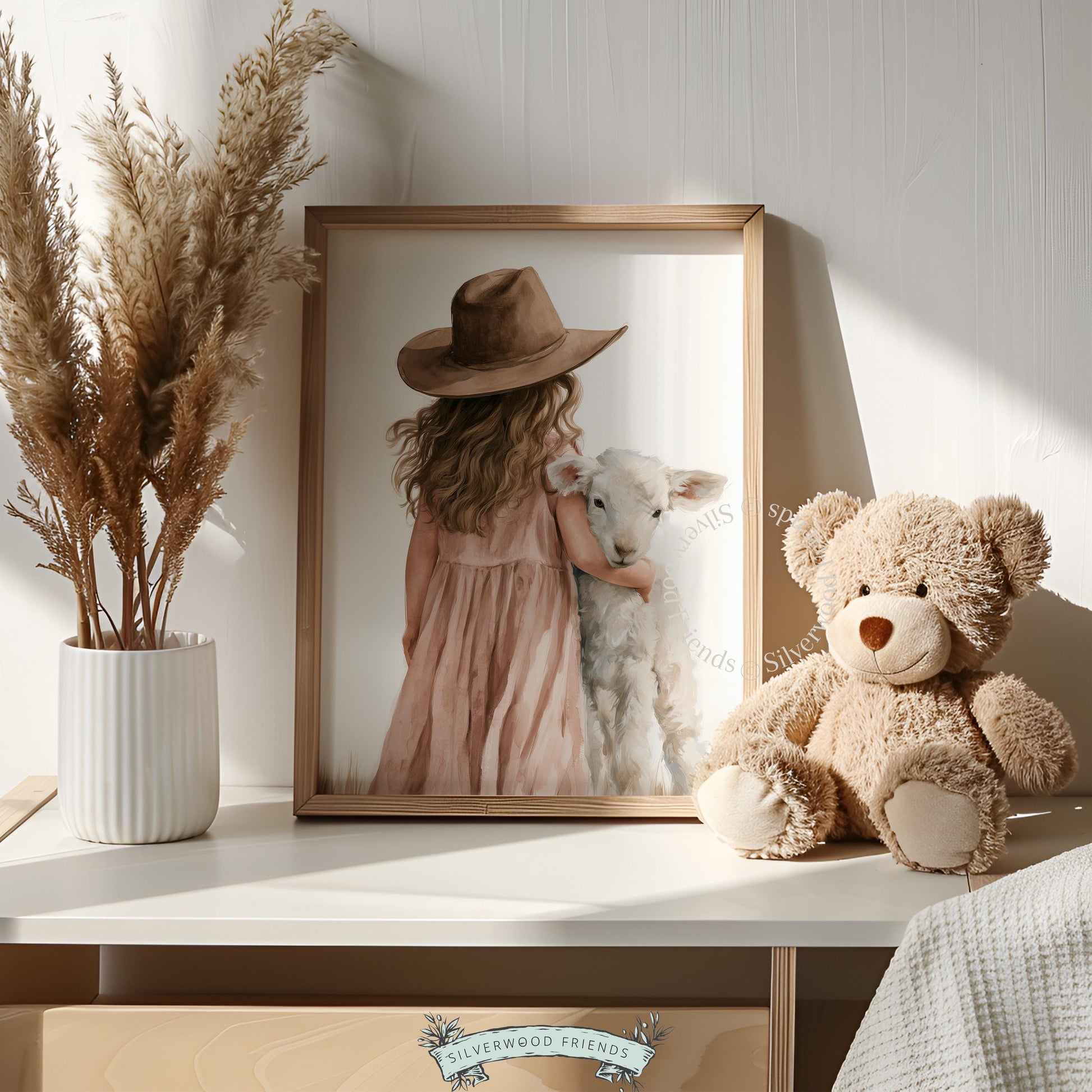 Young child with fluffy lamb wall art for crib — gentle watercolor decor perfect for farm-themed rooms