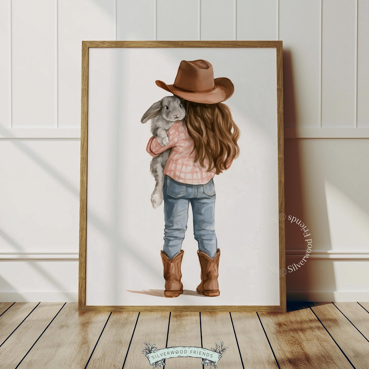 Little girl holding bunny picture for playroom decor — dreamy soft-focus watercolor with farmhouse charm