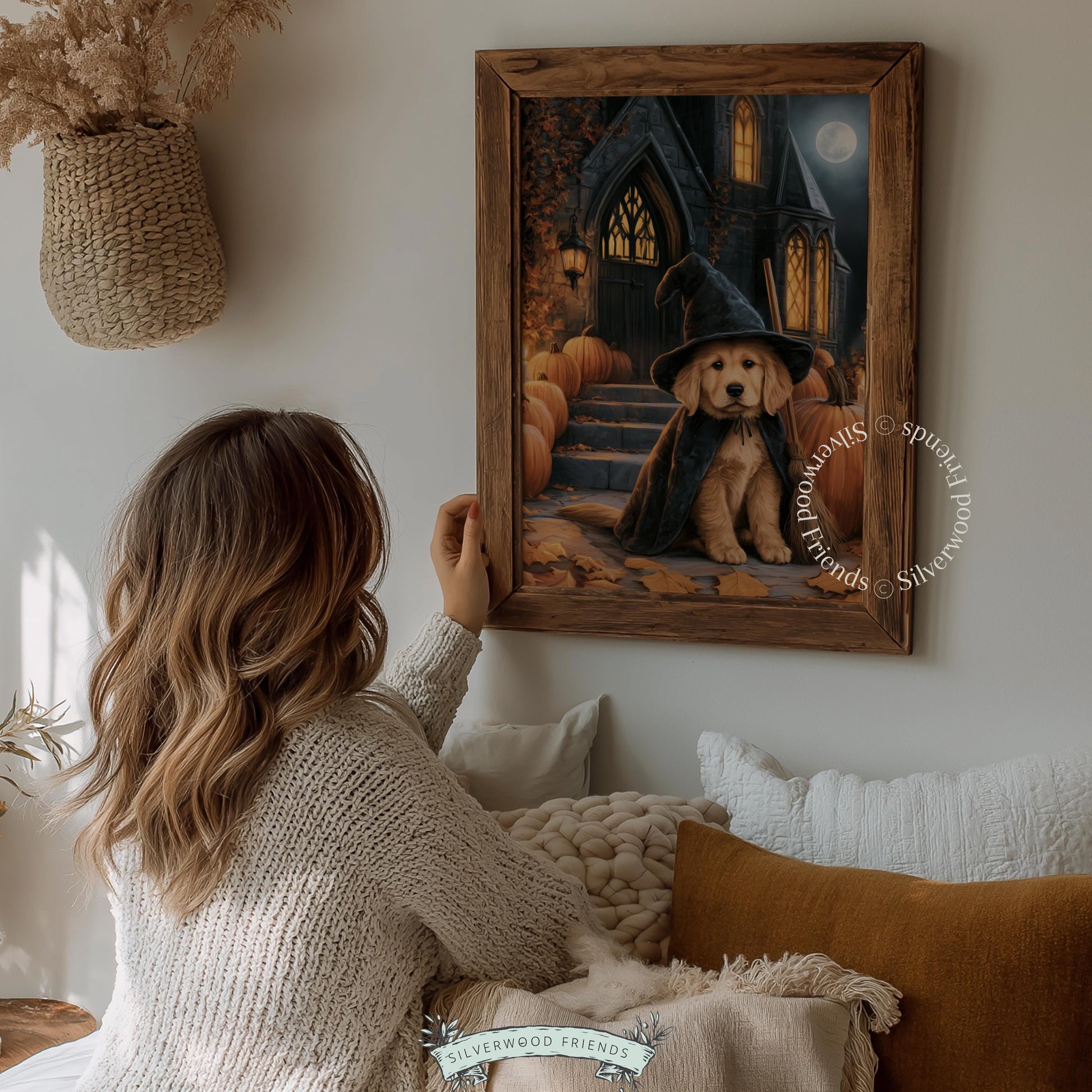 Witchy home wall picture for seasonal décor — adorable puppy in black hat and cape with stone building and glowing windows backdrop