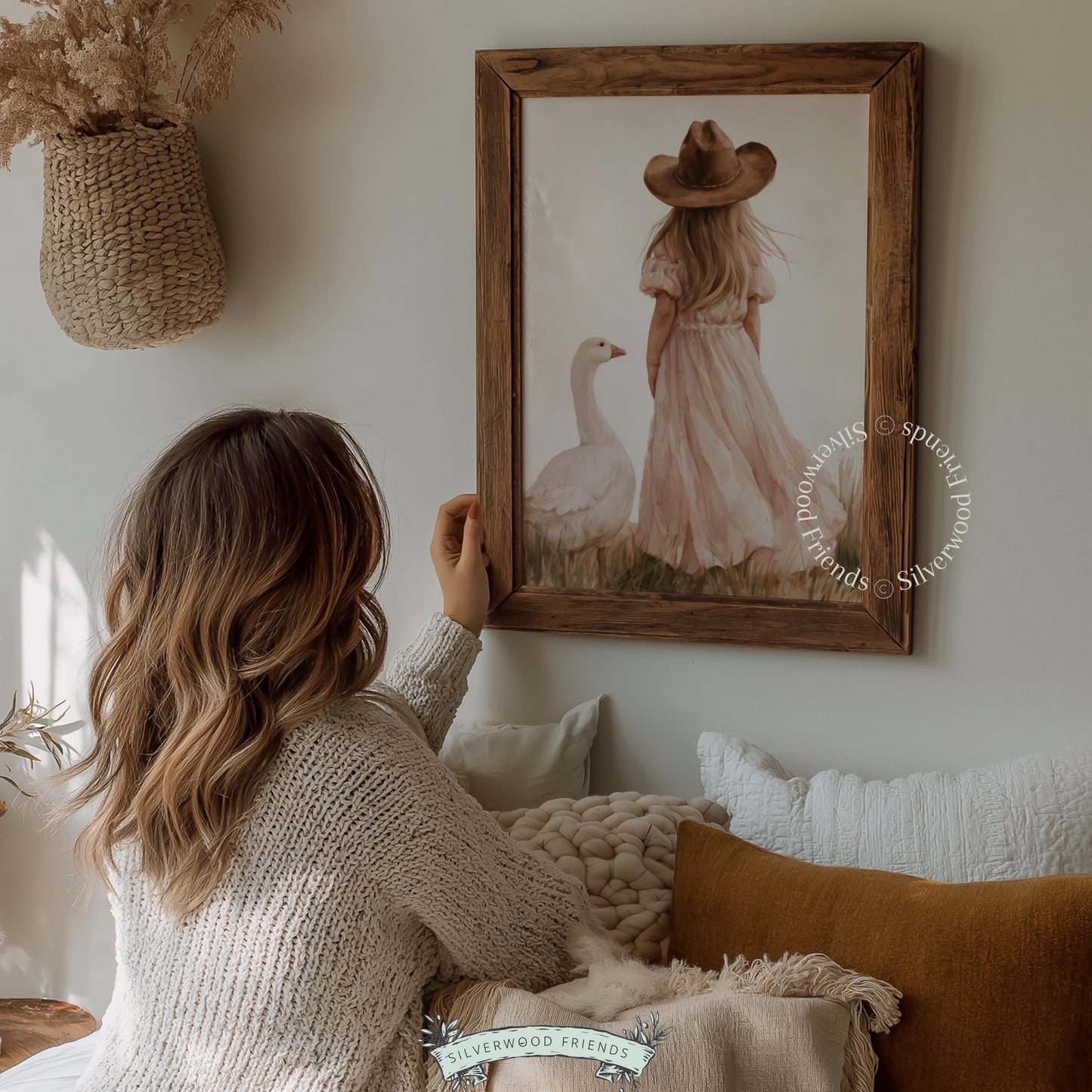 Child with white goose wall decor for toddler room — cream, dusty rose, and wheat color palette