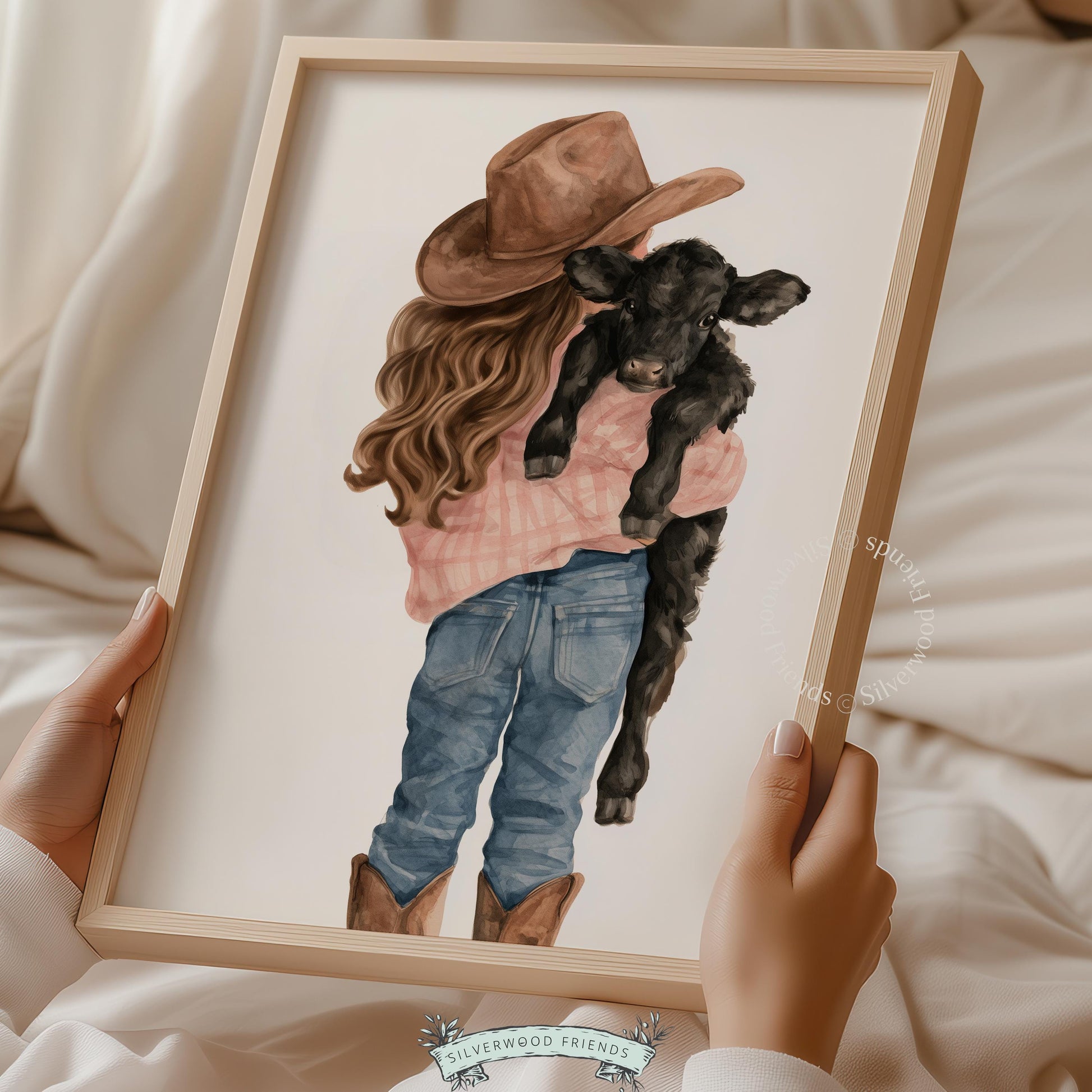 Child holding livestock portrait print for cowgirl nursery — sweet agricultural scene in muted palette