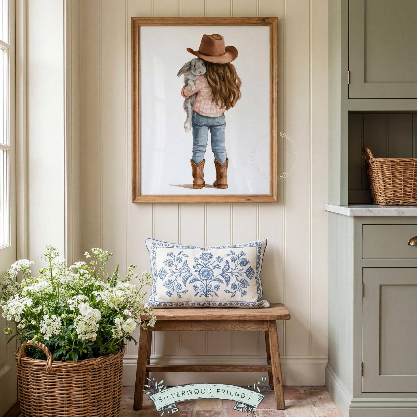 Child hugging bunny wall print for baby girl's room — soft peachy tones with cozy farmhouse western feel