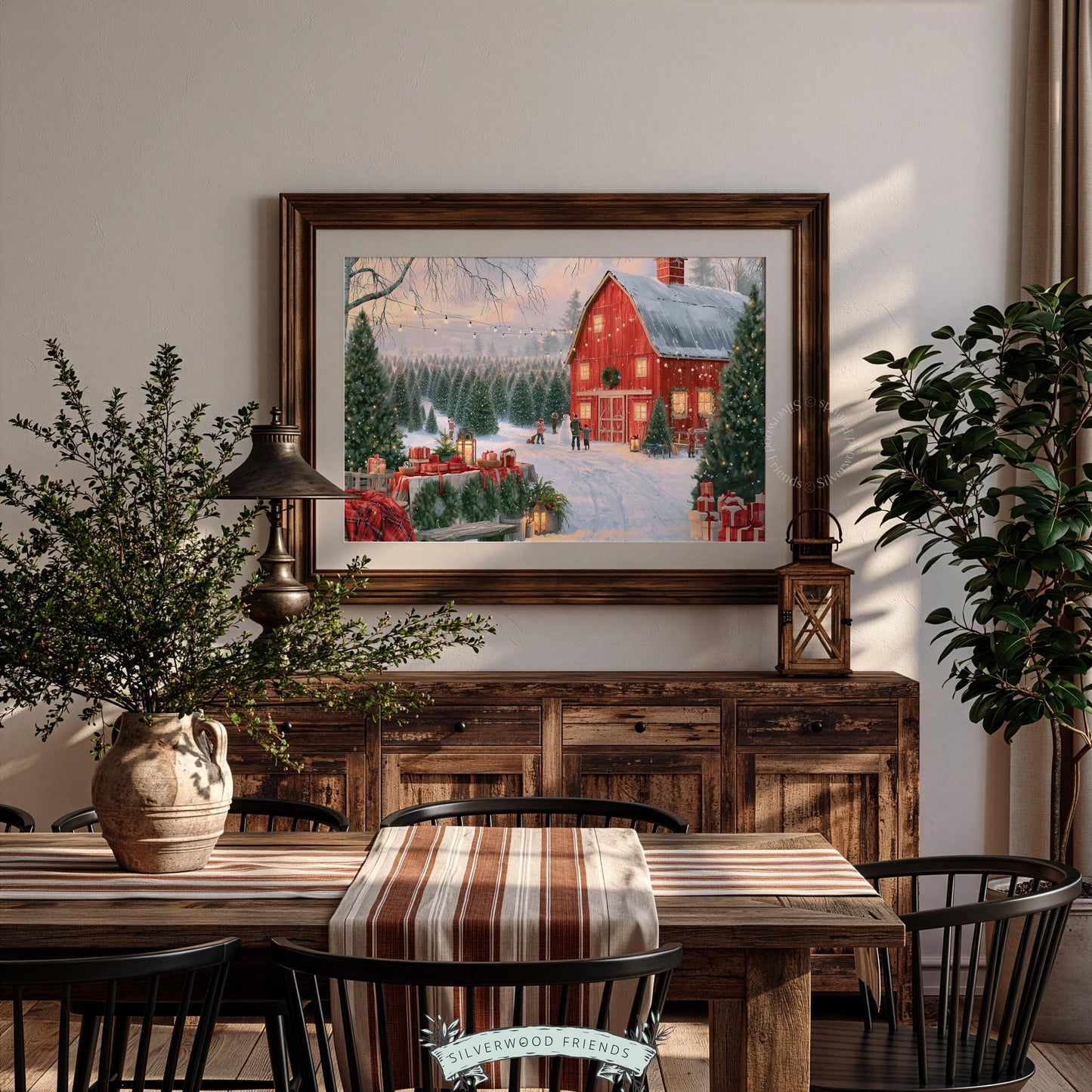 Vintage farmhouse Christmas picture for entryway — glowing red barn among festive winter greenery