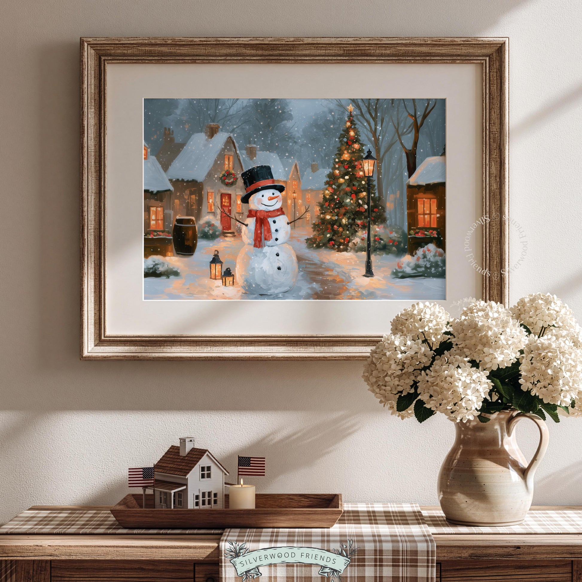 Cozy Christmas wall art for kitchen — snowman in village square surrounded by lamppost and snow-covered buildings