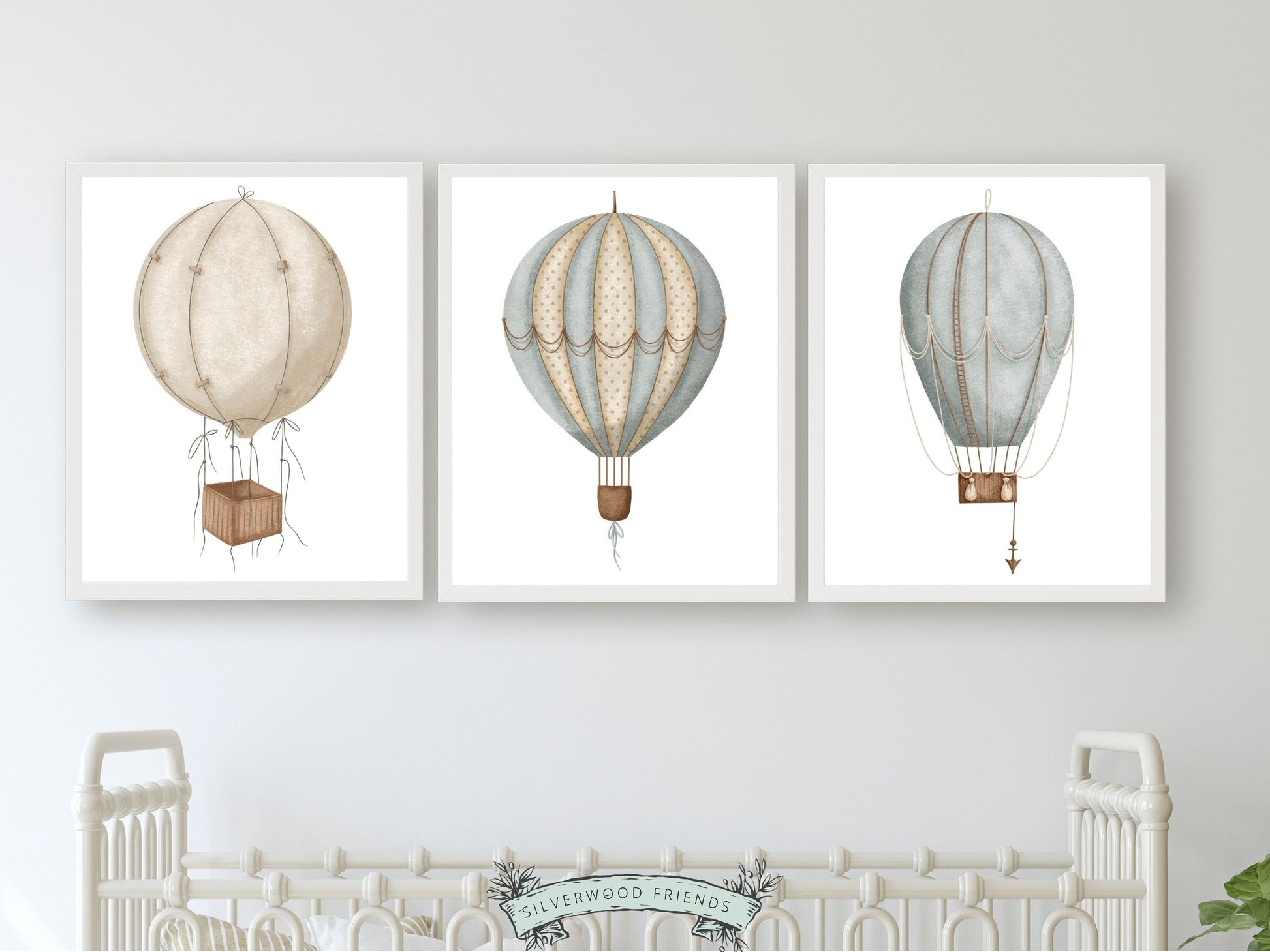 Nursery wall art set of 3 digital prints featuring 3 watercolor hot air balloons in beige/brown, duck egg blue/beige and duck egg blue. This is a digital print and no physical items will be sent to you. Download and print immediately.