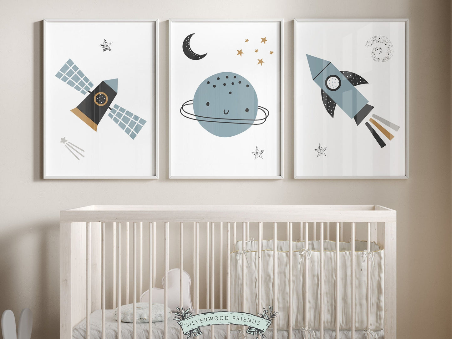 Transform your baby boy&#39;s nursery decor into a realm of cosmic wonder with our enchanting Set of 3 Space Nursery Prints featuring planets, rockets, moon, stars, and spaceships in calming blue and black tones.