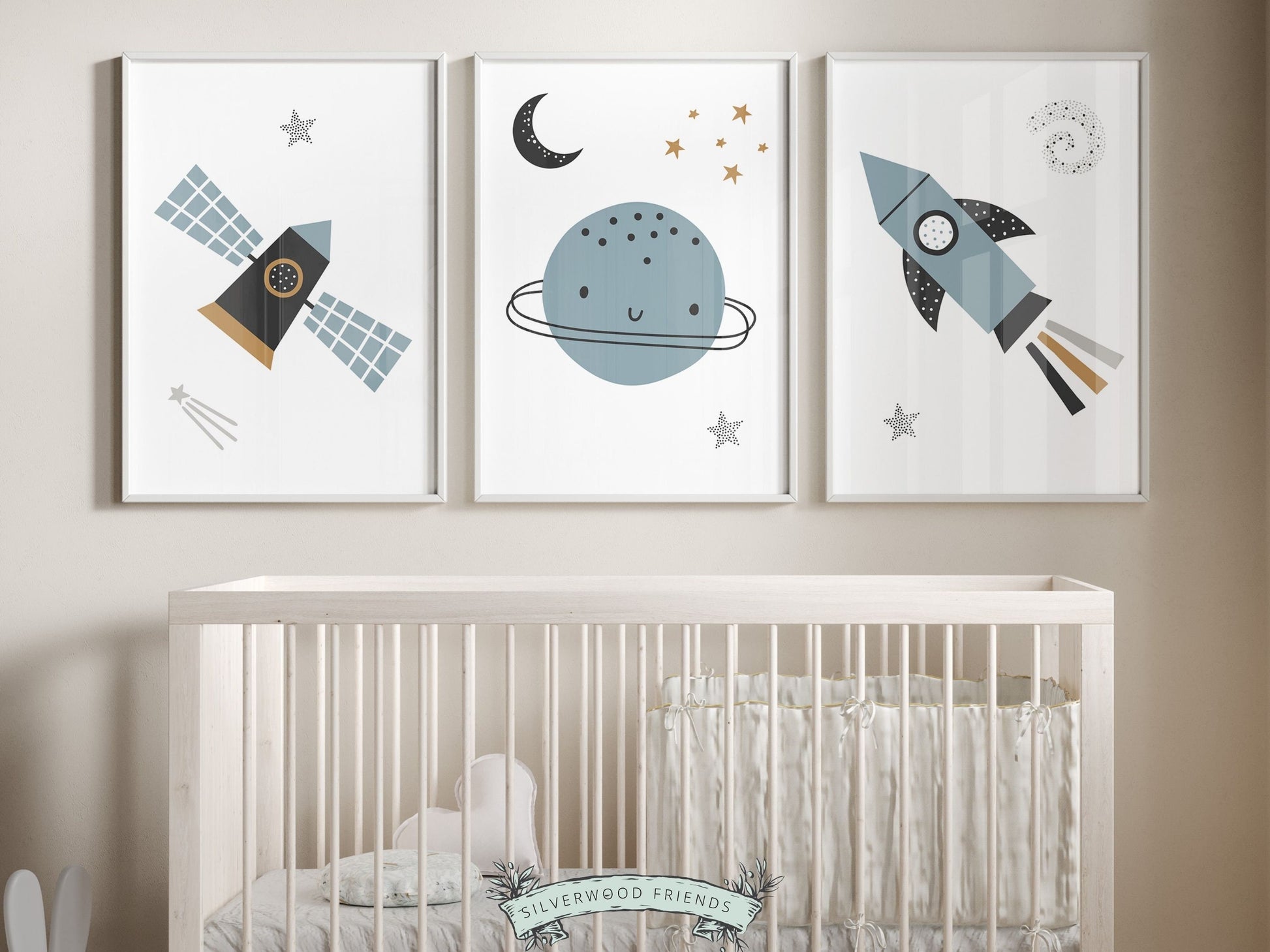 Transform your baby boy&#39;s nursery decor into a realm of cosmic wonder with our enchanting Set of 3 Space Nursery Prints featuring planets, rockets, moon, stars, and spaceships in calming blue and black tones.