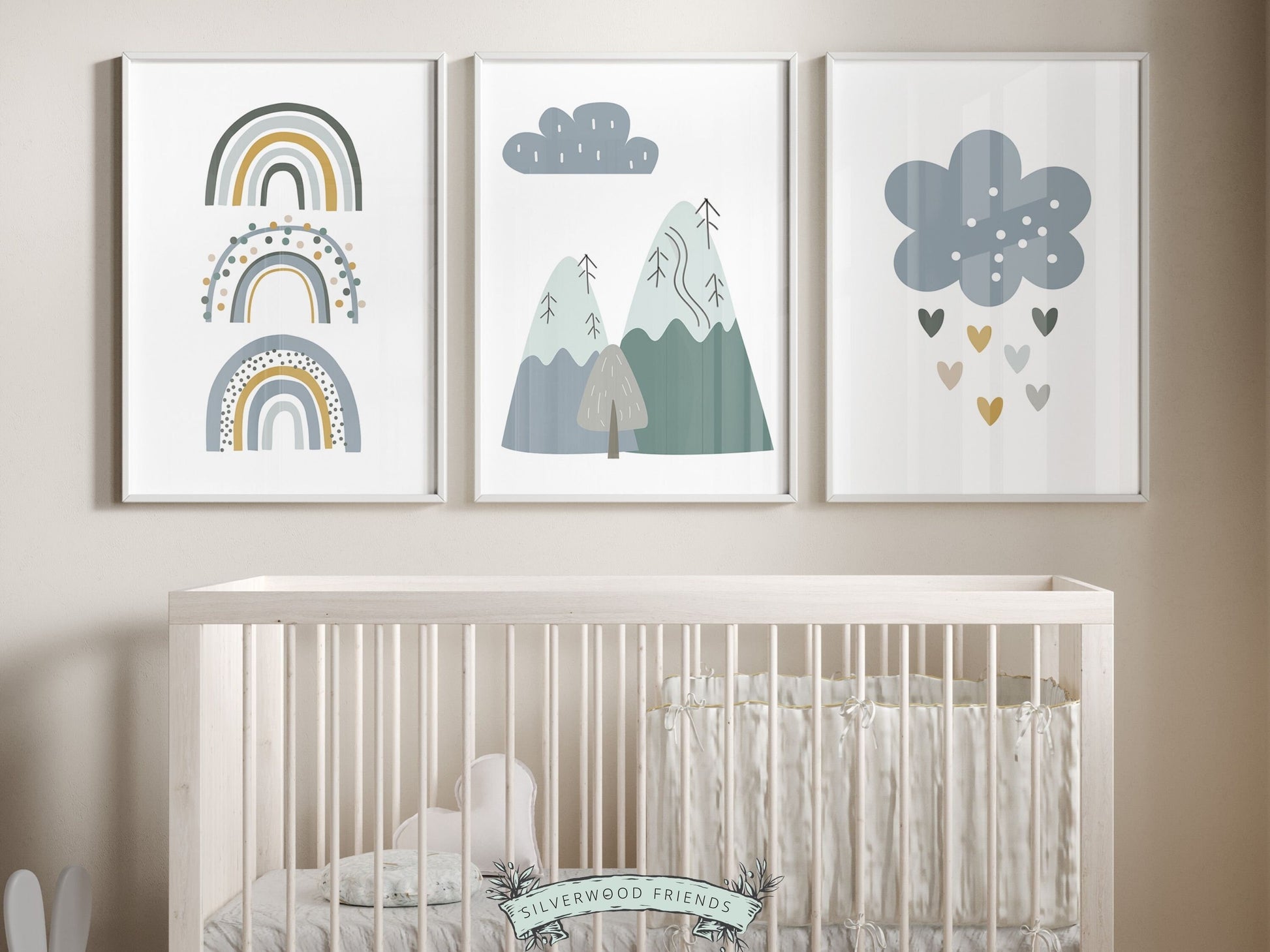 Our Set of 3 Boho Mountain Nursery Prints, featuring Nordic mountains, rainbows and love hearts in tranquil blue and green tones will create a dreamy atmosphere in your little ones nursery. Perfect for your boho nursery decor.