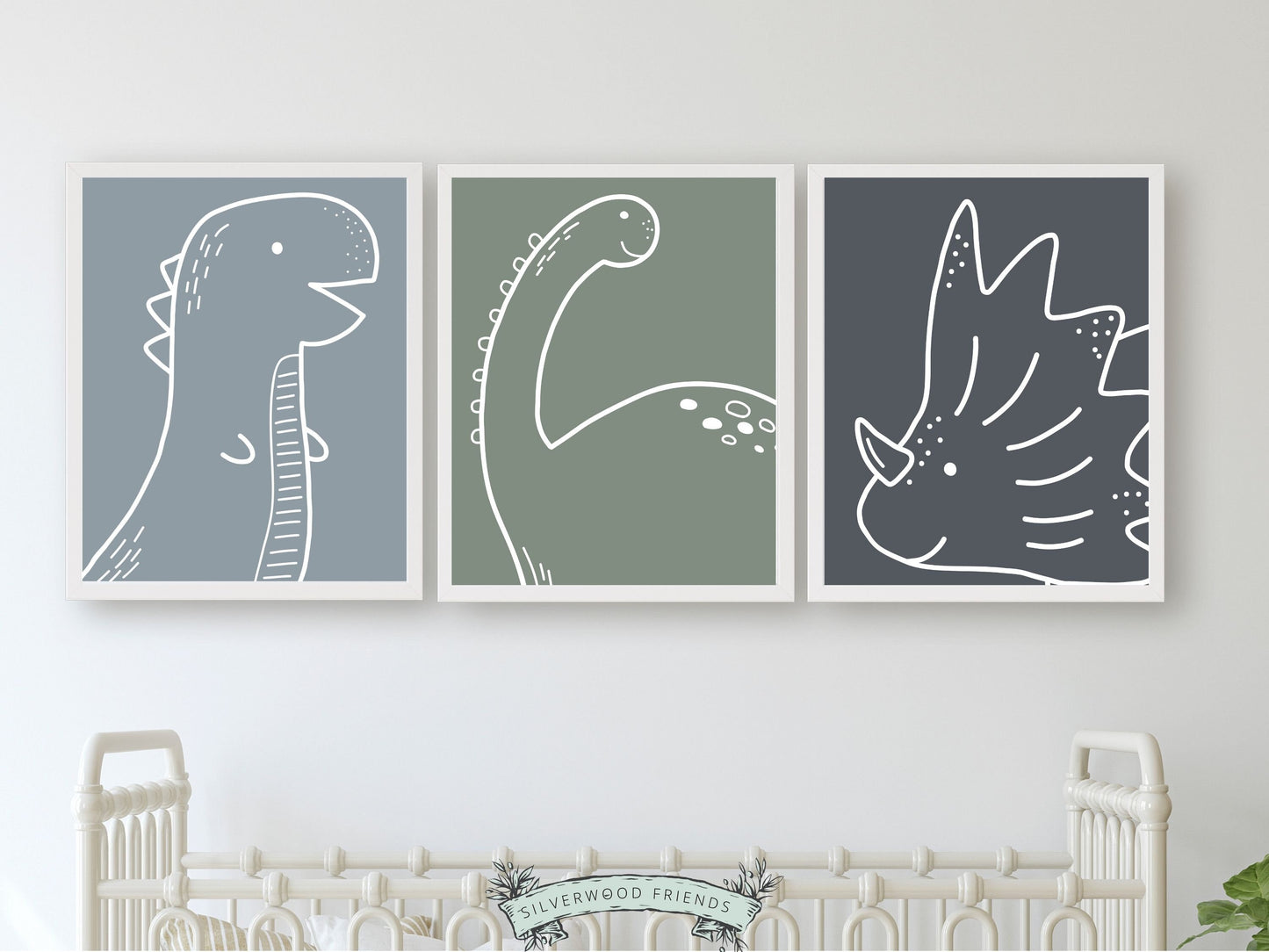 Transform your little ones space into a prehistoric paradise with our Set of 3 Dinosaur Nursery Prints, showcasing the majestic outlines of T-Rex, Brachiosaurus, and Triceratops against soothing blue and green backgrounds.