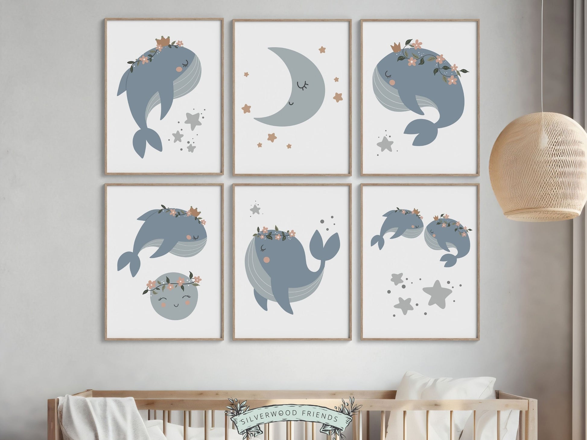 Set of 6 Whale Nursery Prints, featuring serene blue whales soaring amidst stars and the moon. Perfect for your ocean nursery decor or under the sea theme bedroom, and also makes for a delightful and thoughtful ocean themed baby shower gift.