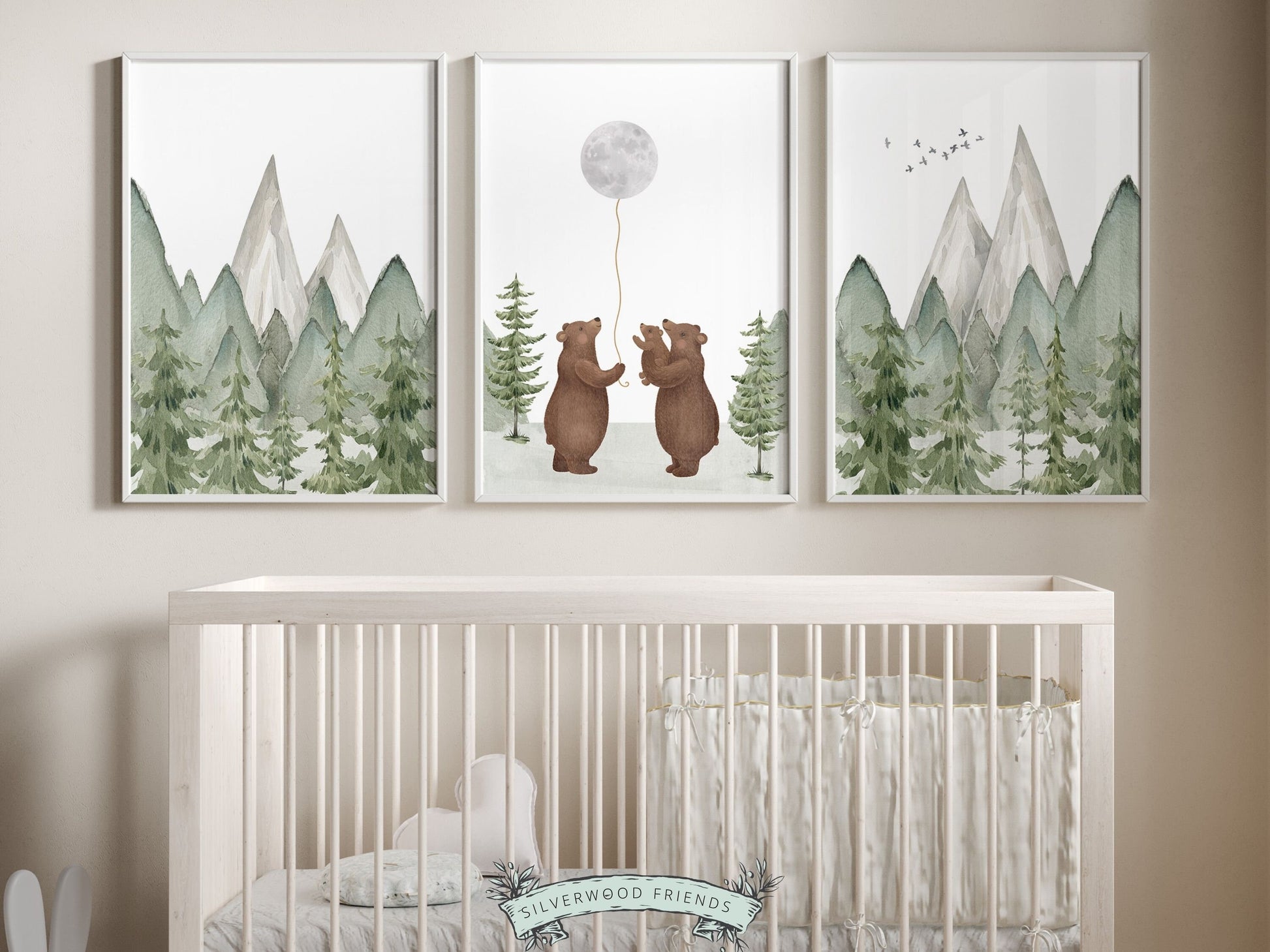 Set of 3 Bear Nursery Prints featuring a family of bears holding the moon and set against a mountain and woodland forest landscape. Ideal for adding a touch of natural beauty to your woodland nursery and makes a unique gender neutral baby shower gift